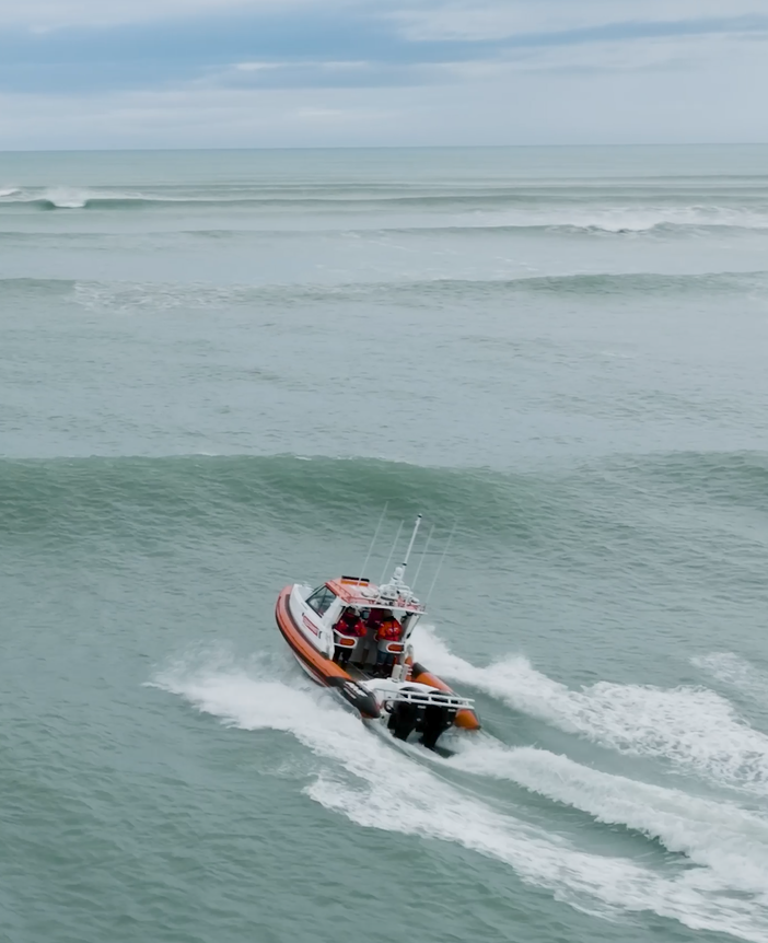 2 Coastguard rescue vessel crossing Foxton bar Manawatū