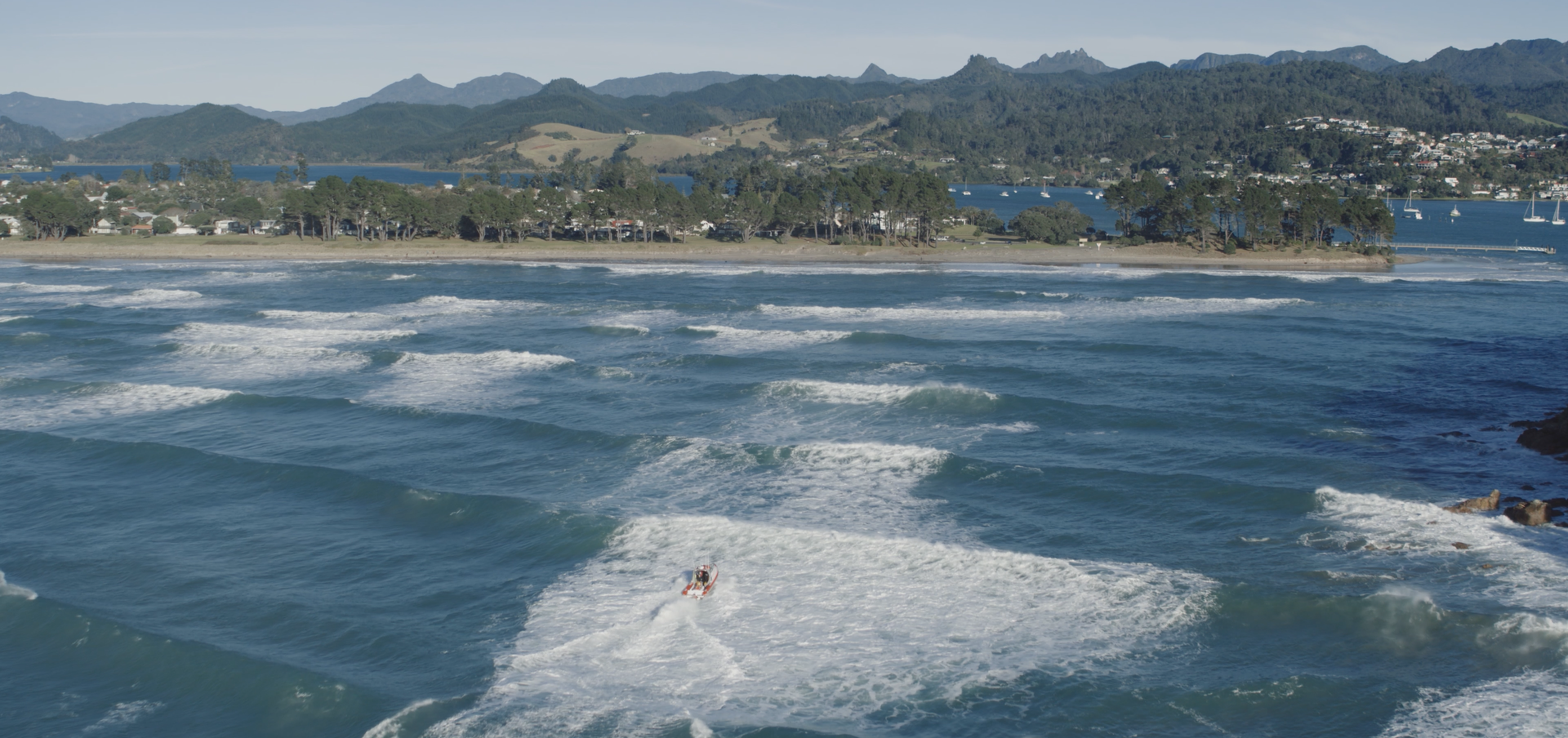 3 Coastguard rescue vessel crossing Tairua bar