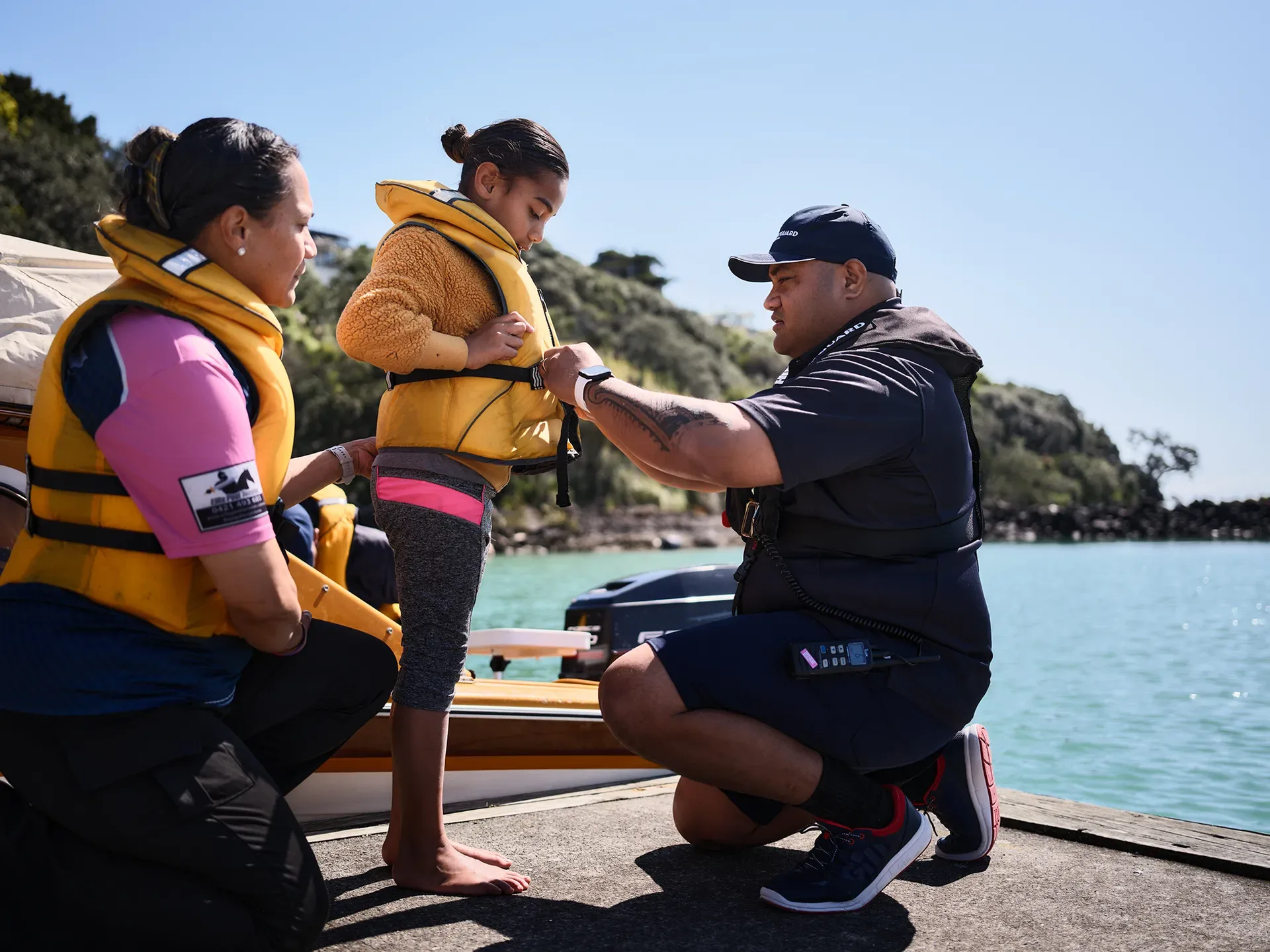 693536 a crew member helping fit a lifejacket web optimised 1920px webp