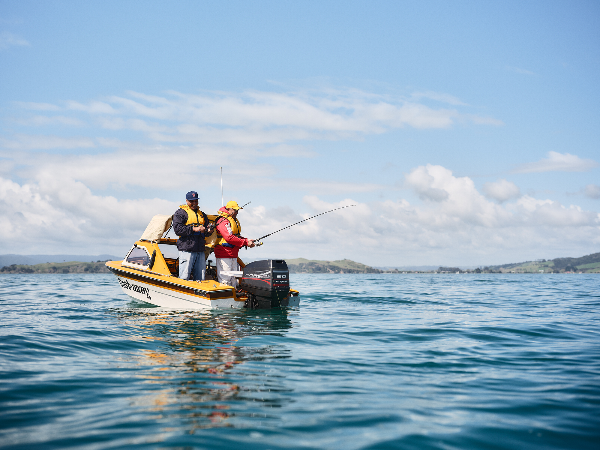 693557 fishing on small boat