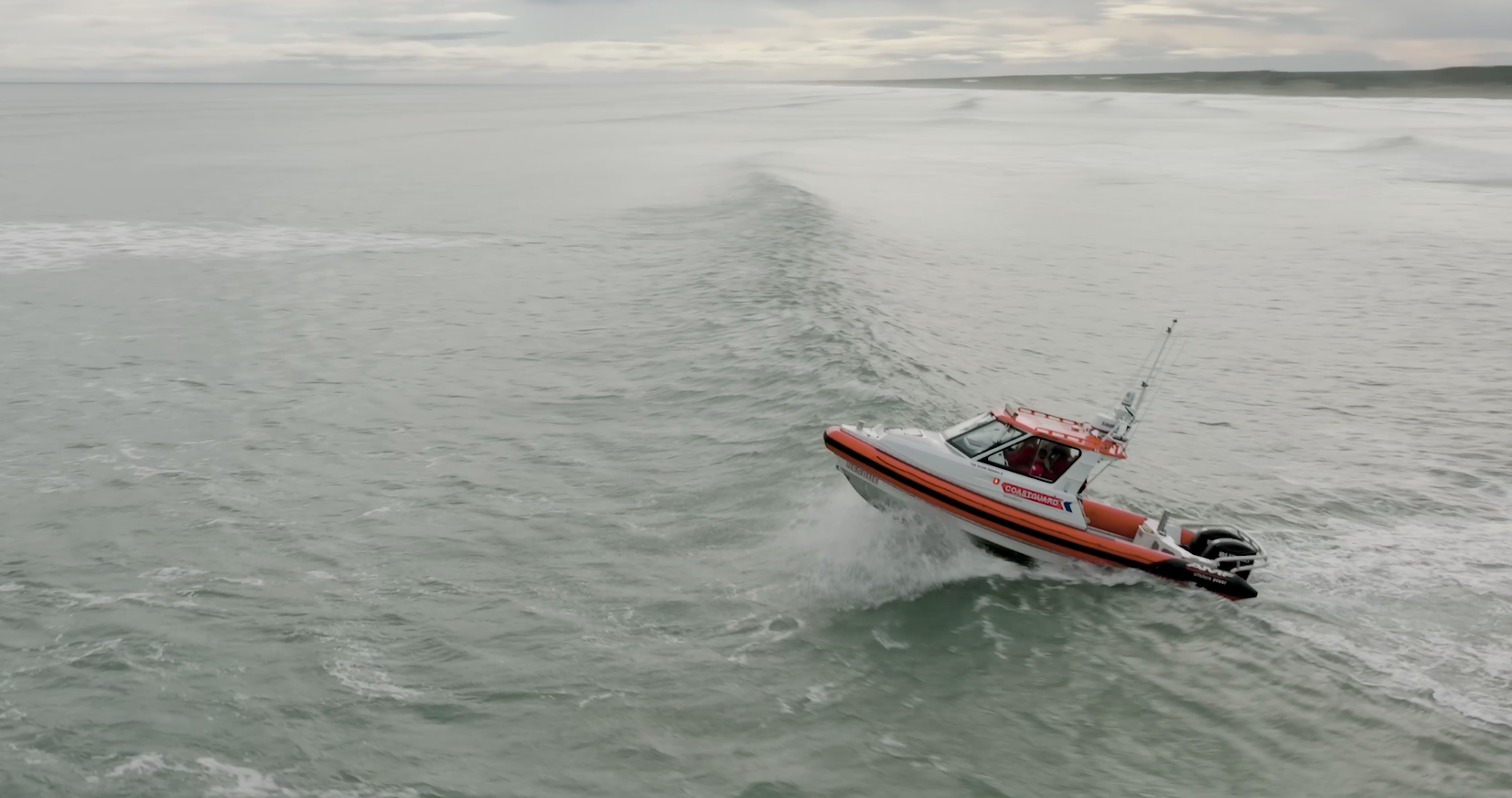 Coastguard rescue vessel crossing Foxton bar Manawatū 02