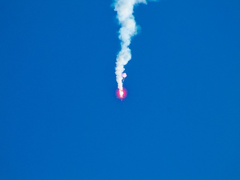 Red flare in sky